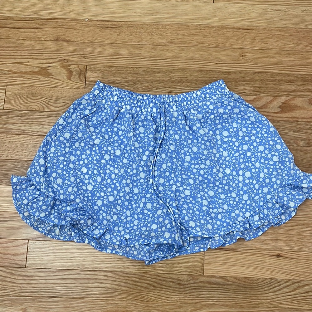 These light blue and white shorts are from sienna sky in size medium.